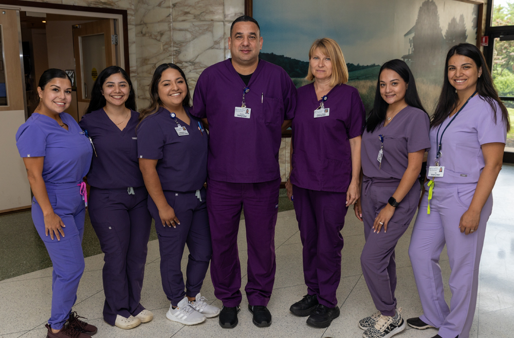 A group of clinical team members standing together who make up the CCH Interpreter Services Team. 